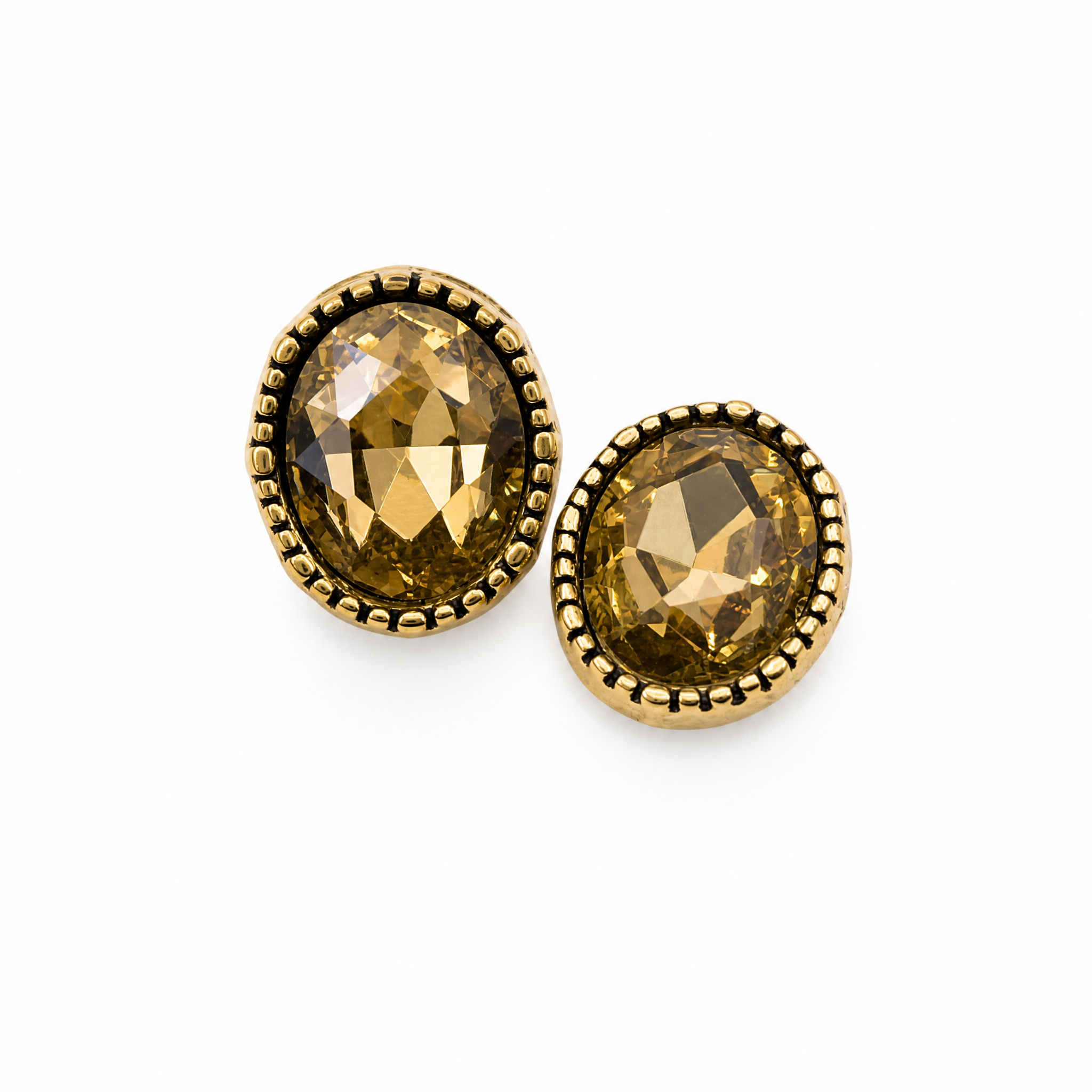 Close-up shot of Blessingmychild premium amber amber crystal dog crocs charms with exquisitely engraved antique gold borders, white background