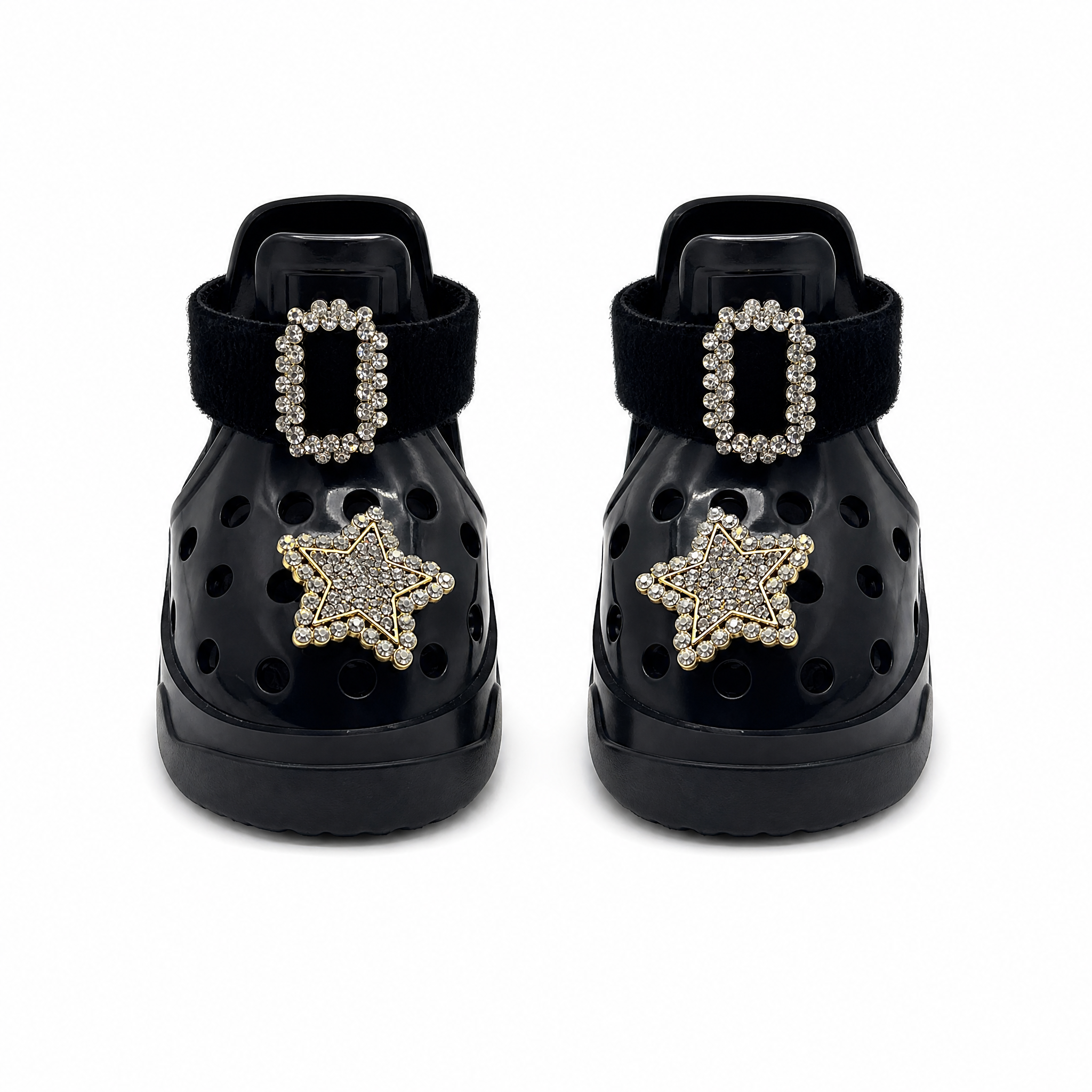A pair of Blessingmychild premium black dog footwear with sparkling golden buckles and retro star embellishments, white background
