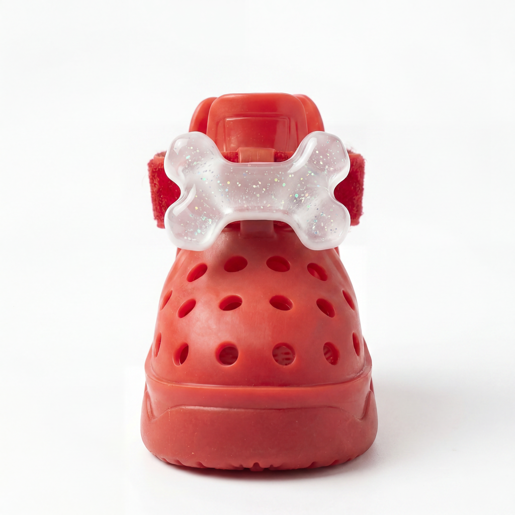 Side view of Blessingmychild interchangeable clear bone pet shoe charm showing the secure back-button snap structure for V2 sandals