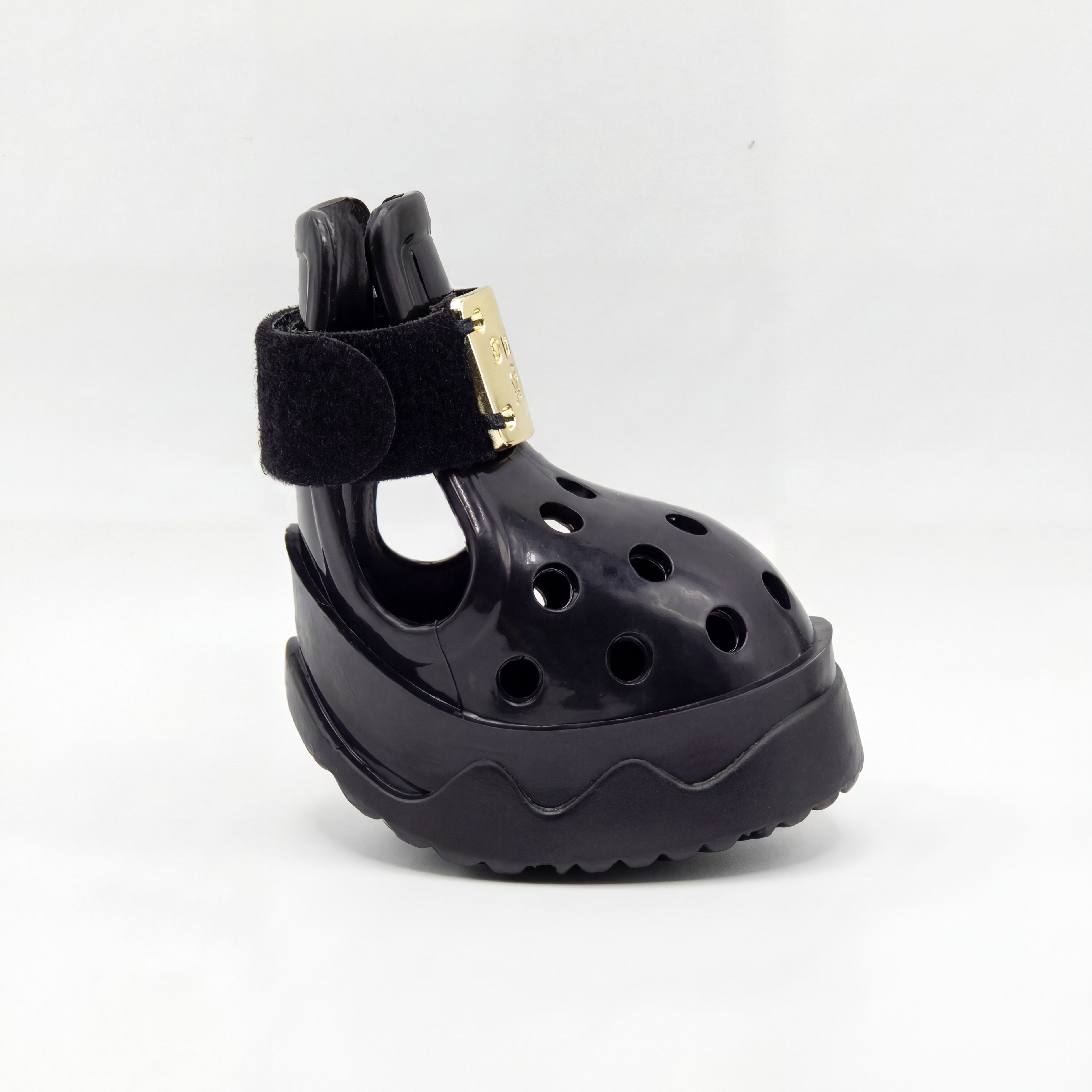 Side profile view of a single Blessingmychild V1 classic knight black dog shoe showcasing its breathable cutouts and luxury front gold hardware