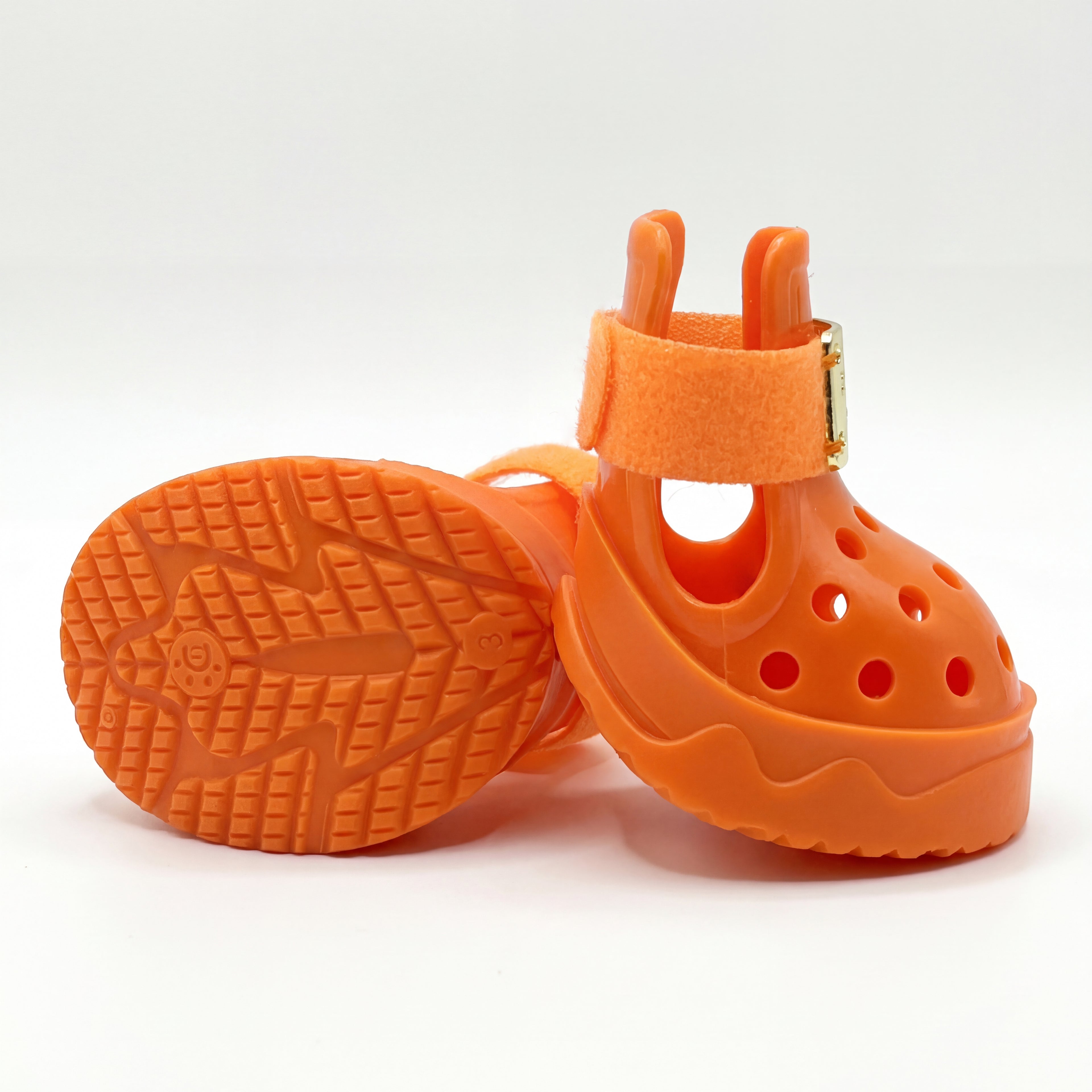 Bottom look of Blessingmychild V1 orange pet footwear showing the strong grip anti-slip rubber patterned sole and flexible design