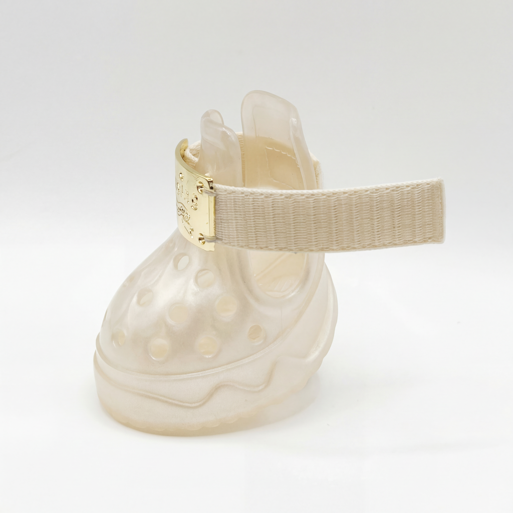 Side view of Blessingmychild V1 classic pearl white dog footwear with its soft adjustable ankle strap extended open