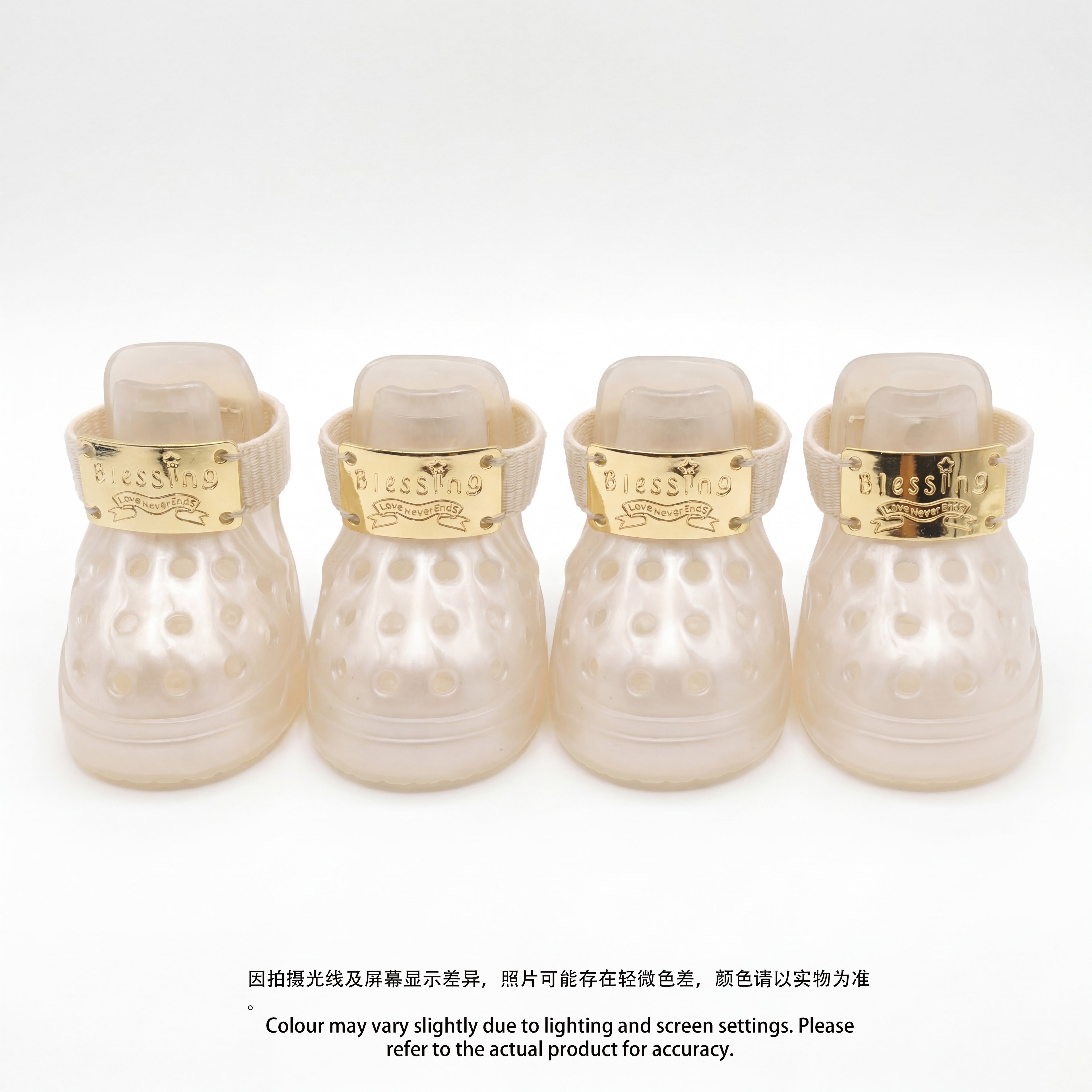 Four Blessingmychild V1 classic pearl white dog shoes lined up on a white background featuring the iconic front-facing brand gold tags