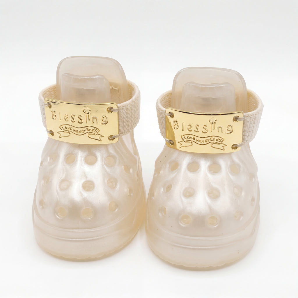 Front view of a pair of Blessingmychild V1 white-moonlight dog sandals highlighting the pristine brand gold hardware
