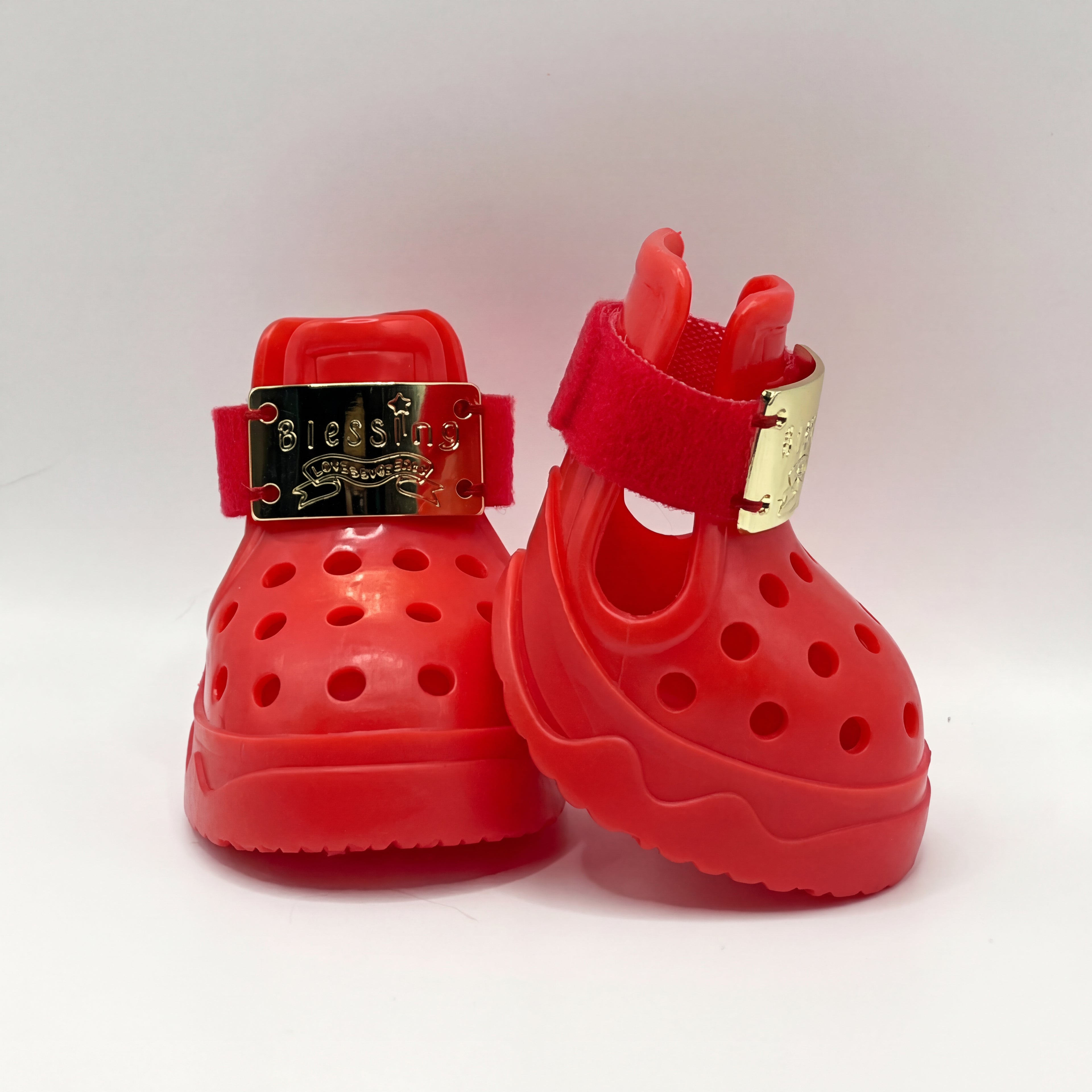 Side and rear view of Blessingmychild V1 limited edition red pet crocs showcasing the breathable design and secure straps
