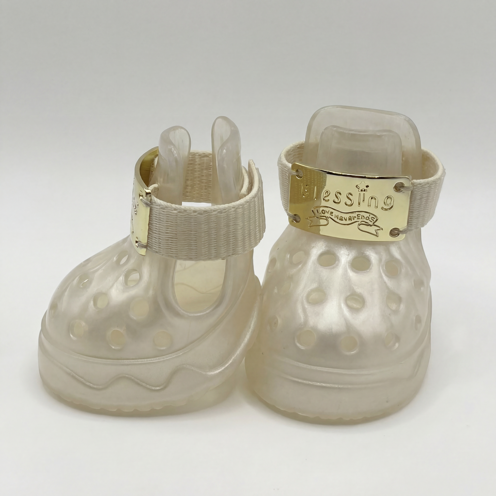 Side and front view of Blessingmychild V1 limited edition pearl white puppy shoes showcasing the breathable cutouts and secure strap